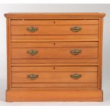 A VICTORIAN SATIN BIRCH ROUND CORNER CHEST OF TWO SHORT AND THREE LONG GRADUATED PANELLED DRAWERS,