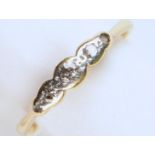 A DIAMOND FIVE STONE RING, WITH RUB OVER SETTINGS, GOLD HOOP MARKED 18CT & PT, 1G, SIZE O½ One stone