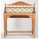 A VICTORIAN PINE MARBLE TOPPED WASHSTAND WITH FOLIATE CARVED ARCHED BACK ABOVE SPINDLE GALLERY AND