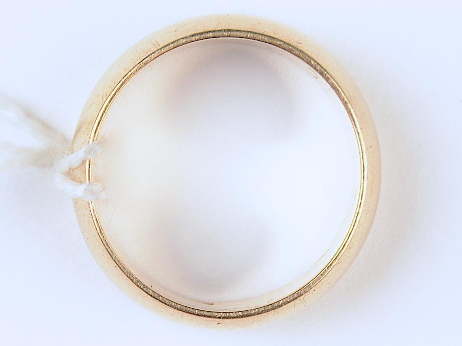 A GOLD WEDDING BAND, UNMARKED, 7.5G, SIZE M Light wear, apparently made from several other rings - Image 2 of 2