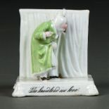 "THE LANDLORD IN LOVE". A GERMAN PORCELAIN FAIRING, C1862-70, THE BASE UNGLAZED, 90MM H, INCISED