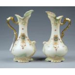 A PAIR OF S FIELDING & CO CROWN DEVON EARTHENWARE EWERS, EARLY 20TH C, DECORATED WITH FESTOONS ON