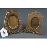 TWO PIERCED AND ENGRAVED GILT BRASS PHOTOGRAPH FRAMES, C1880, ONE RECTANGULAR, THE OTHER CARTOUCHE