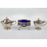 A GEORGE III PIERCED OVAL SILVER SALT CELLAR, BLUE GLASS LINER, CRESTED, 80MM L, MARKS RUBBED, BY