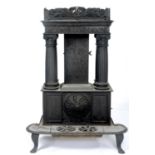 A FEDERAL AMERICAN CAST IRON STOVE, MID 19TH C, ONE END INSCRIBED ABOVE THE DOOR MORRISON &