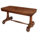 A WILLIAM IV ROSEWOOD LIBRARY TABLE, C1835, THE CUT CORNERED TOP ON TURNED END SUPPORTS WITH LOTUS