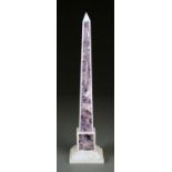 A GRAND TOUR STATUTARY MARBLE AND AMETHYSTINE QUARTZ NEO CLASSICAL STYLE OBELISK, 20TH C, ON STEPPED