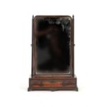 A GEORGE II MAHOGANY DRESSING MIRROR, MID 18TH C, THE 'CADDY' MOULDED CAVETTO BASE FITTED THREE