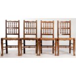 A SET OF FOUR OAK LANCASHIRE STYLE SPINDLE BACK RUSH SEATED DINING CHAIRS, MID 20TH C, TURNED LEGS