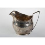A GEORGE III SILVER CREAM JUG, WITH ENGRAVED BAND, REEDED HANDLE AND RIM,  9.5CM H, MAKER IM,
