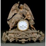 A LATE 19TH C SPELTER  MANTEL CLOCK, THE DRUM SHAPED CASE WITH WINGED ANGEL AND INFANT, STANDING