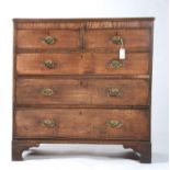 A GEORGE III OAK CHEST OF DRAWERS, C1780, THE RECTANGULAR TOP WITH REEDED LIP ABOVE TWO SHORT AND