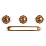 A SET OF THREE GOLD DRESS STUDS, MARKED 9CT, 1.8G Some wear