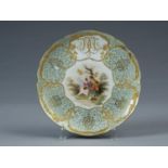 A BERLIN MONOGRAMMED DESSERT PLATE, C1900. PAINTED TO THE CENTRE WITH A YOUNG WOMAN AND HER SUITOR