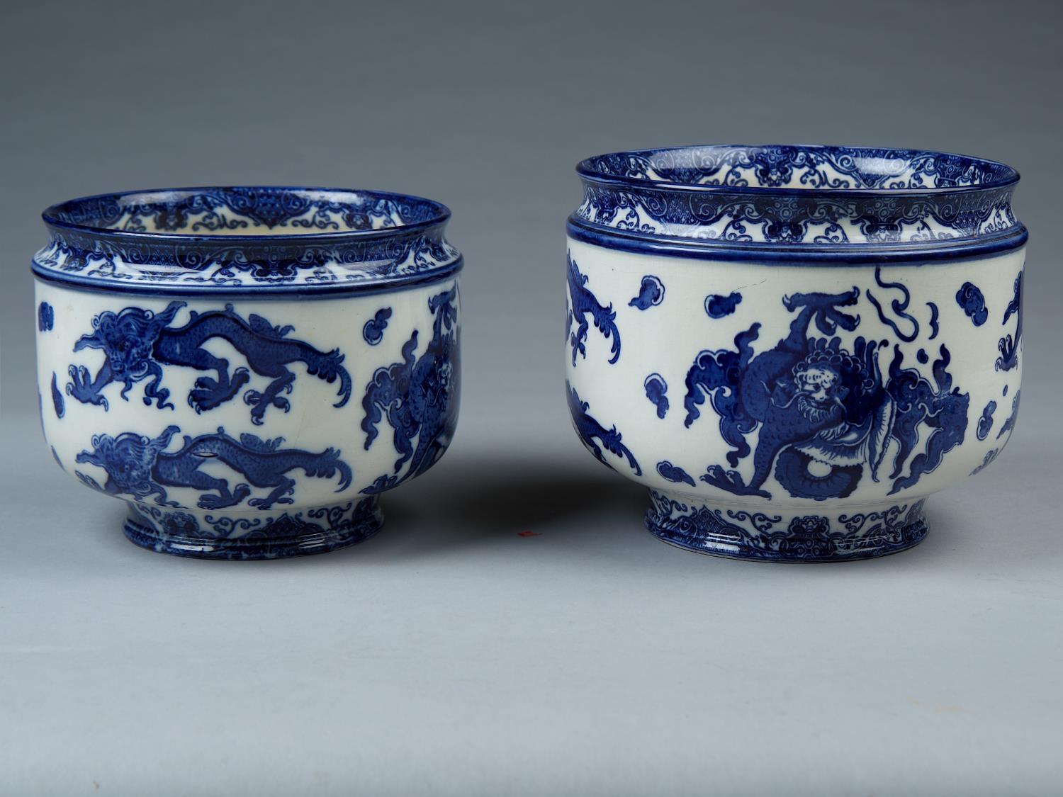 TWO GRADUATED ROYAL DOULTON BLUE PRINTED EARTHENWARE OYAMA PATTERN JARDINIERES, EARLY 20TH C, 16 AND