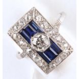 AN ART DECO DIAMOND AND SYNTHETIC SAPPHIRE RECTANGULAR CLUSTER RING, WITH CALIBRE AND OLD CUT