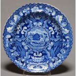 A STEVENSON AND WILLIAMS BLUE PRINTED EARTHENWARE BEEHIVE AND VASES PATTERN SOUP PLATE, C1825, 24.