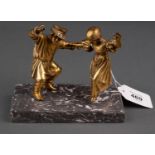 A MINIATURE GILT BRONZE GROUP OF RUSSIAN PEASANT DANCERS, 19TH C OR LATER,  ON  GREY COMPOSITE BASE,