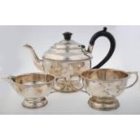 A GEORGE VI SILVER TEA SERVICE OF URNULAR FORM WITH BEADED RIM, TEAPOT 15.5CM H, BY A L DAVENPORT