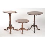 A VICTORIAN WALNUT TRIPOD TABLE, C1870, THE PETAL SHAPED FIGURED TOP WITH TEXTURED LIP RELIEF CARVED