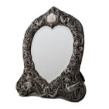 AN EDWARD VII SILVER DRESSING MIRROR, THE DIE STAMPED MOUNT WITH BIRDS, GROTESQUES AND OPEN