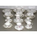 A SHELLEY MOCHA SHAPE LOWESTOFT PATTERN TEA SERVICE, C1928, THE SERVICE INCLUDING TWO SHAPED