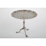 A GEORGE V SILVER   BONBON STAND IN THE FORM OF AN 18TH C TRIPOD TABLE,  TOP 11CM DIAM, BY THE