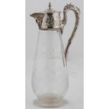 A VICTORIAN SILVER MOUNTED GLASS CLARET JUG WITH BEARDED MASK LIP, THE DOMED LID AND COLLAR CHASED