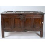 A LATE 17TH C OAK FOUR PANEL BLANKET CHEST, C1680, THE HINGED LID WITH CHANNELED FRAME ABOVE A