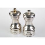 A GRADUATED PAIR OF ELIZABETH II SILVER SALT AND PEPPER MILLS, 10 AND 10.5CM H, BY A J POOLE,
