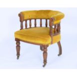 A VICTORIAN WALNUT TUB CHAIR, C1880, THE PADDED ARM BOW ON TURNED GALLERY, POTTERY CASTORS, SEAT