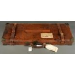 A LEATHER COVERED OAK GUN CASE, WILLIAM POWELL & SON BIRMINGHAM, POST 1902, ORIGINALLY FOR A PAIR OF