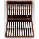 A SET OF TWELVE VICTORIAN MOTHER OF PEARL HAFTED SILVER DESSERT KNIVES AND FORKS, BY WILLIAM