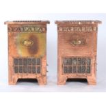 TWO EARLY ELECTRIC COPPER FINISHED EMBOSSED BRASS ILLUMINATED HEATERS, ECLIPSE SYSTEM BIRMINGHAM,