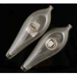 TWO ENGLISH GLASS BOAT SHAPED BABY FEEDING BOTTLES, 19TH C, 21 AND 21.5CM L Good condition