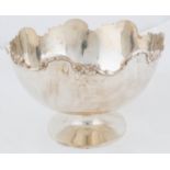 A GEORGE V SILVER ROSE BOWL WITH UNDULATING APPLIED C SCROLL AND FLOWER RIM, 15.5CM H, BY MAPPIN AND