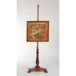 A VICTORIAN MAHOGANY POLE SCREEN, C1850, THE RECTANGULAR BANNER WORKED IN FLORAL GROS POINT, LAPET