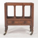 A REGENCY ROSEWOOD CANTERBURY, C1820, FITTED WITH A DRAWER, ON BOBBIN TURNED LEGS WITH BRASS