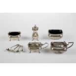 FIVE VICTORIAN AND EARLY 20TH C GADROONED SILVER MUSTARD POTS, SALT CELLARS AND A PEPPERETTE, BLUE