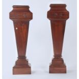 A NEAR PAIR OF REPRODUCTION MAHOGANY PEDESTALS IN NEO CLASSICAL STYLE, SQUARE TOPS ABOVE FLUTED