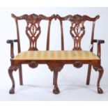 A REPRODUCTION MAHOGANY CHAIR BACK SOFA IN GEORGE III STYLE, THE TWIN BACK WITH LEAF AND SHELL