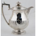 A GEORGE III GADROONED SILVER COFFEE POT, OF BALUSTER FORM, THE DOMED LID WITH INTEGRAL HINGE, THE