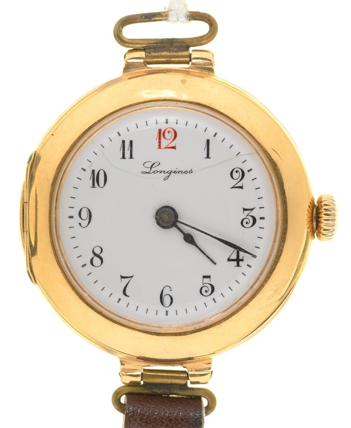 A 18CT GOLD LONGINES LADY'S WRISTWATCH, C1920,  WITH ENAMEL DIAL AND GOLD CUVETTE, 29MM, SWISS