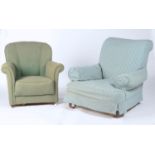 AN UPHOLSTERED ARMCHAIR WITH LOOSE COVER, ON BUN FEET AND A SMALL UPHOLSTERED ARMCHAIR WITH BUTTON