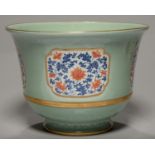 A CHINESE CELADON AND UNDERGLAZE BLUE JARDINIERE, REPUBLIC PERIOD, FINELY PAINTED IN THE MANNER