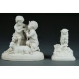 A ROBINSON AND LEADBEATER PARIAN WARE GROUP OF THE INFANT CHRIST AND ST JOHN AND A SPILL HOLDER