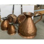 A VICTORIAN COPPER FOUR GALLON HAYSTACK MEASURE, TWO SMALLER HAYSTACK MEASURES AND TWO VICTORIAN