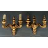 A PAIR OF MODERN GILTWOOD  TWIN BRANCH SCROLLING WALL LIGHTS, THE SPLIT COLUMNS FOLIATE AND LAPPET