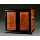 AN EBONY AND AMBOYNA COLLECTOR'S CABINET, C1870, THE PANELLED DOORS OPENING TO REVEAL FOUR GRADUATED