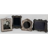 FOUR ELIZABETH II SILVER PHOTOGRAPH FRAMES, IN VICTORIAN OR ART NOUVEAU STYLE, VARIOUS SIZES, ONE 18